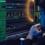 Hacks - A Man Looking at a Computer Screen with Data