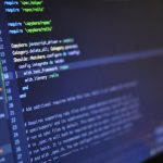 Programs - Close Up Photo of Programming of Codes